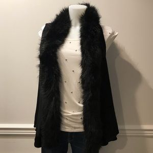 Questions faux fur vest sweater. Amazing fit!